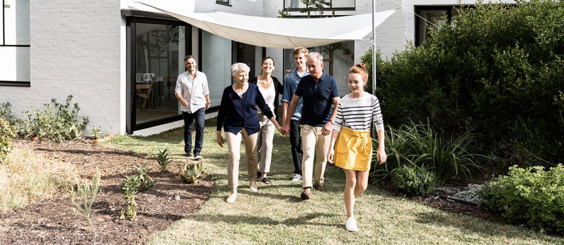 Three generations in the front yard