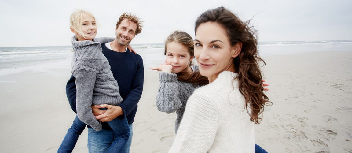 Young family on beach