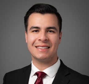 Logan Lopez Head Shot Photo in Suit