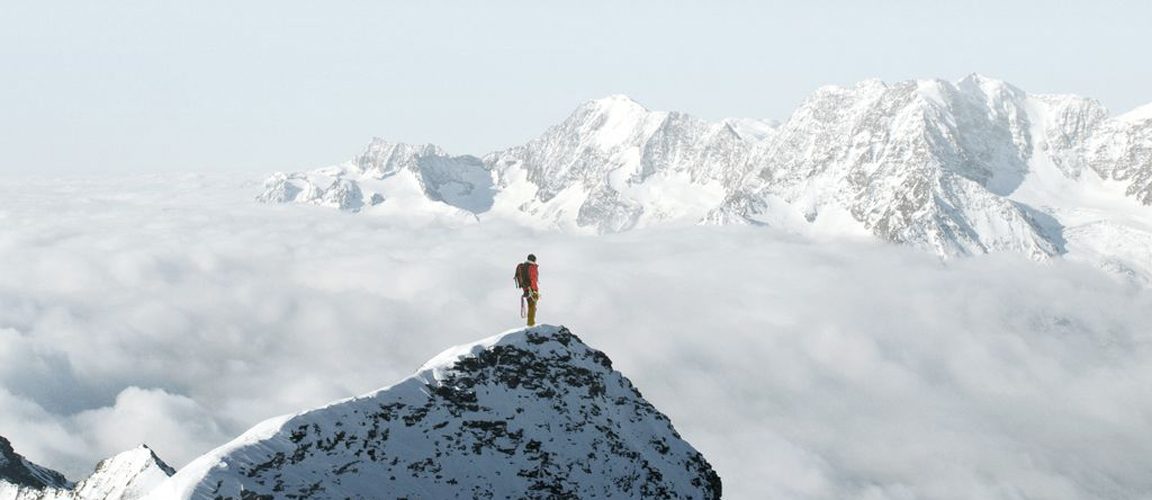 Person standing on mountaintop