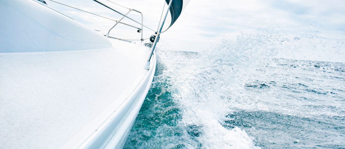 Sailboat splashing in water