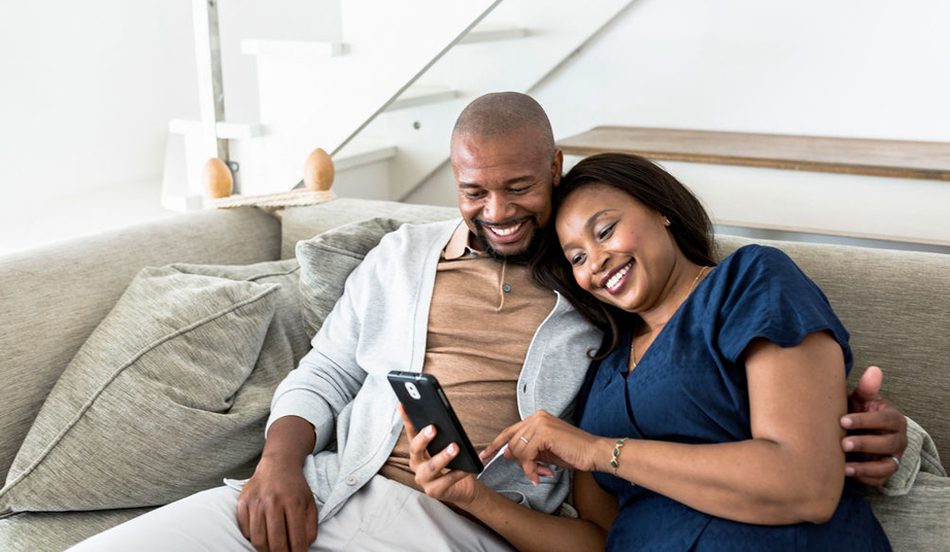 Adult couple on cell phone